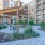 Outdoor lounge at Cadence at Frisco Station apartments in Frisco, TX, featuring outdoor seating and a fire pit.